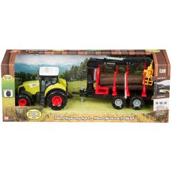 Bulltraktor med sl�p f�r tr�dstammar